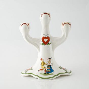A candelabrum in ceramic named "Daldansen", Rörstrand, from early 20th century.