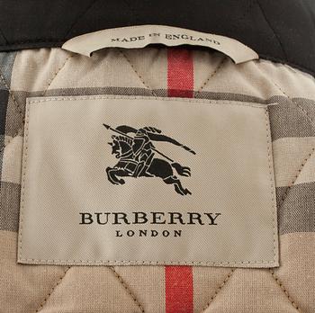 BUBERRY, a black quilted short jacket.