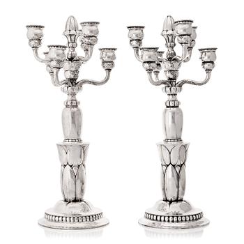 149. Georg Jensen, a pair of six lights silver candelabra, Copenhagen 1920, design nr 38.