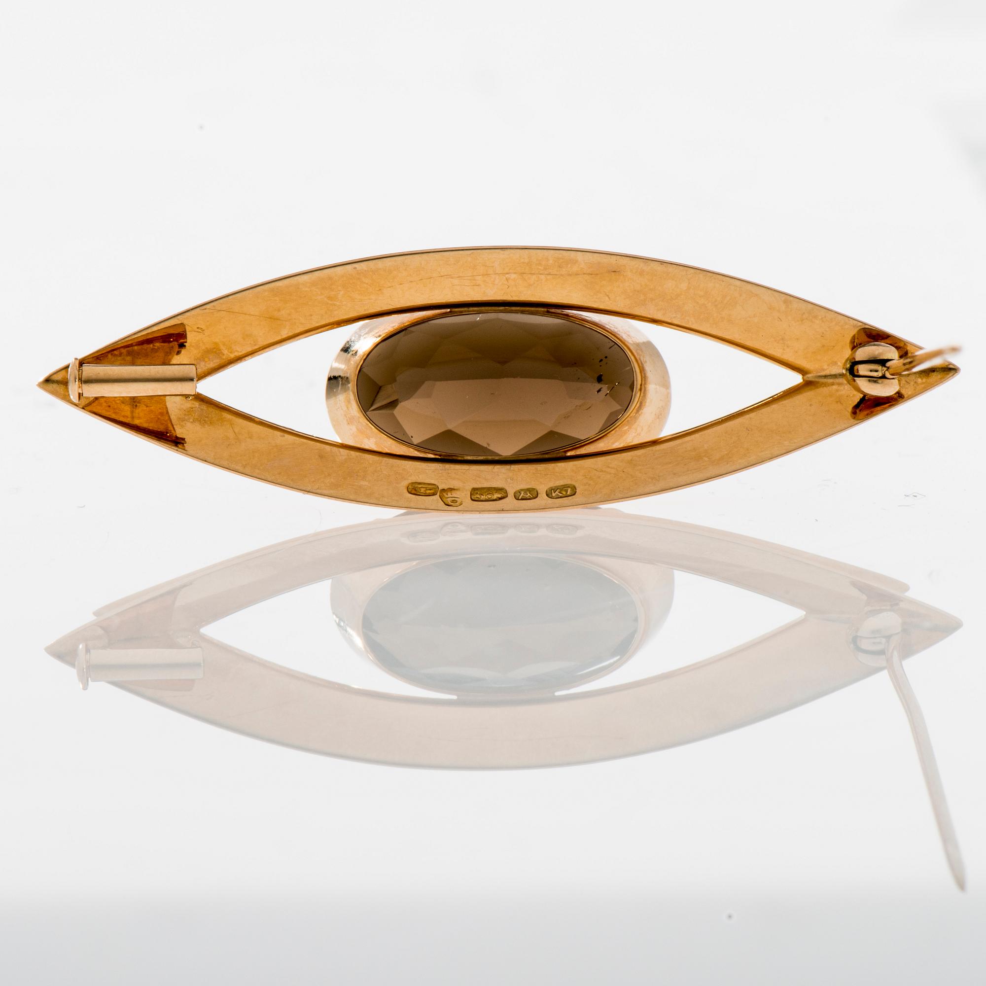 BROSCH, 14K guld, rökkvarts. Kupittaan Kulta 1963. Vikt ca 8,8 g.