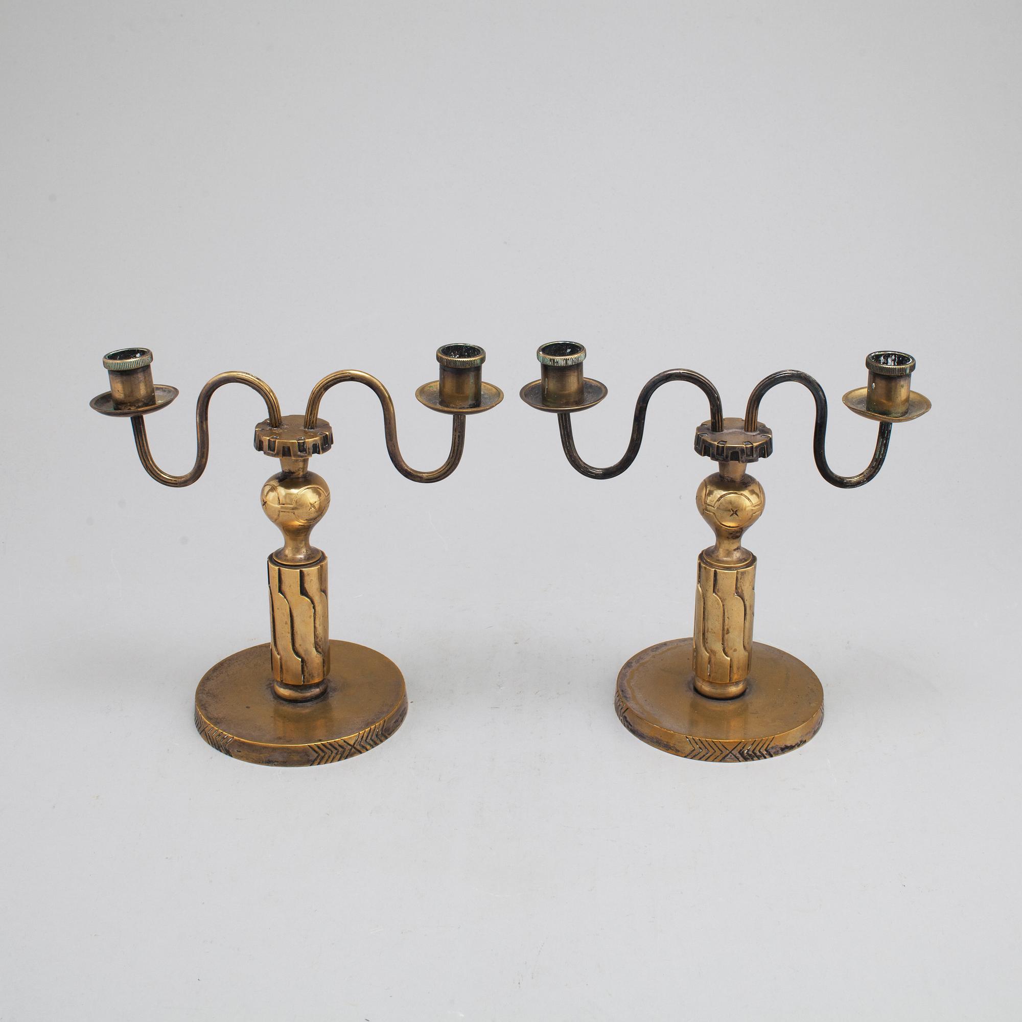 A pair of bronze candelabra, marked H. Bergman, 1920's/30's.