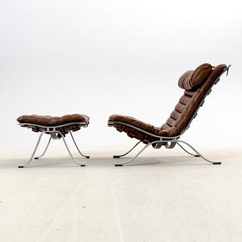 Arne Norell, a metal and leather Ari easy chair and foot stool after 1966.