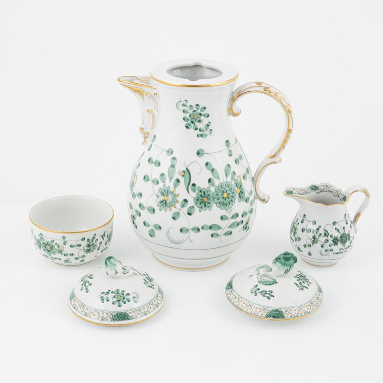 An 83-piece 'Indische Malerei Grün' dinner and coffee porcelain service, Miessen, 20th Century.