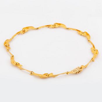 An 18K gold Lapponia necklace design Björn Weckström.