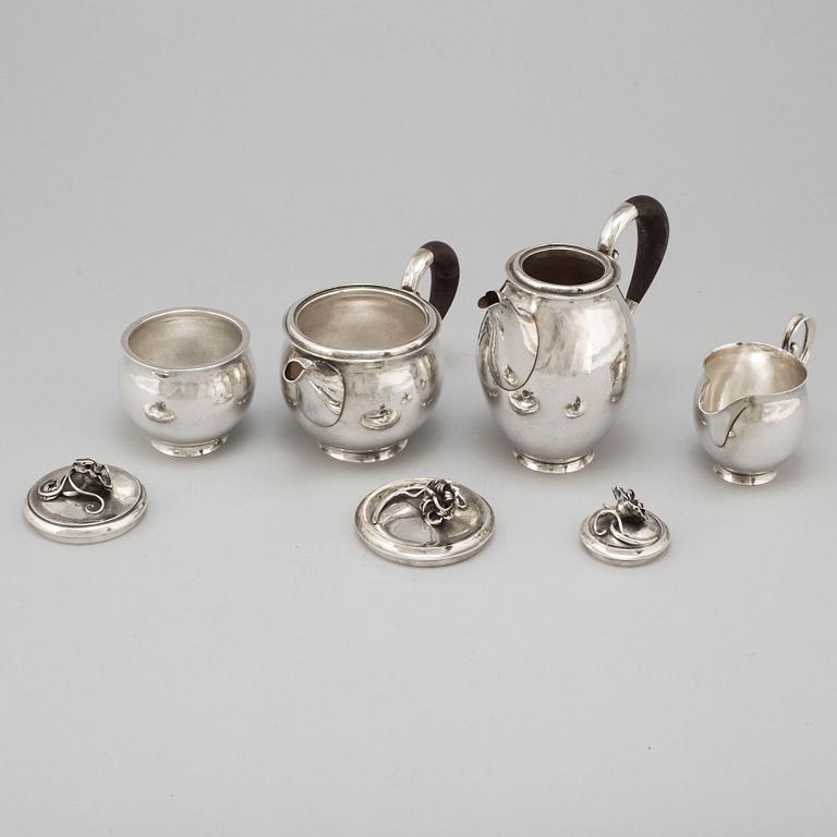 JÖRGEN JENSEN, a four pcs silver tea and coffee service with tray, Nordiska Kompaniet, Stockholm 1929.