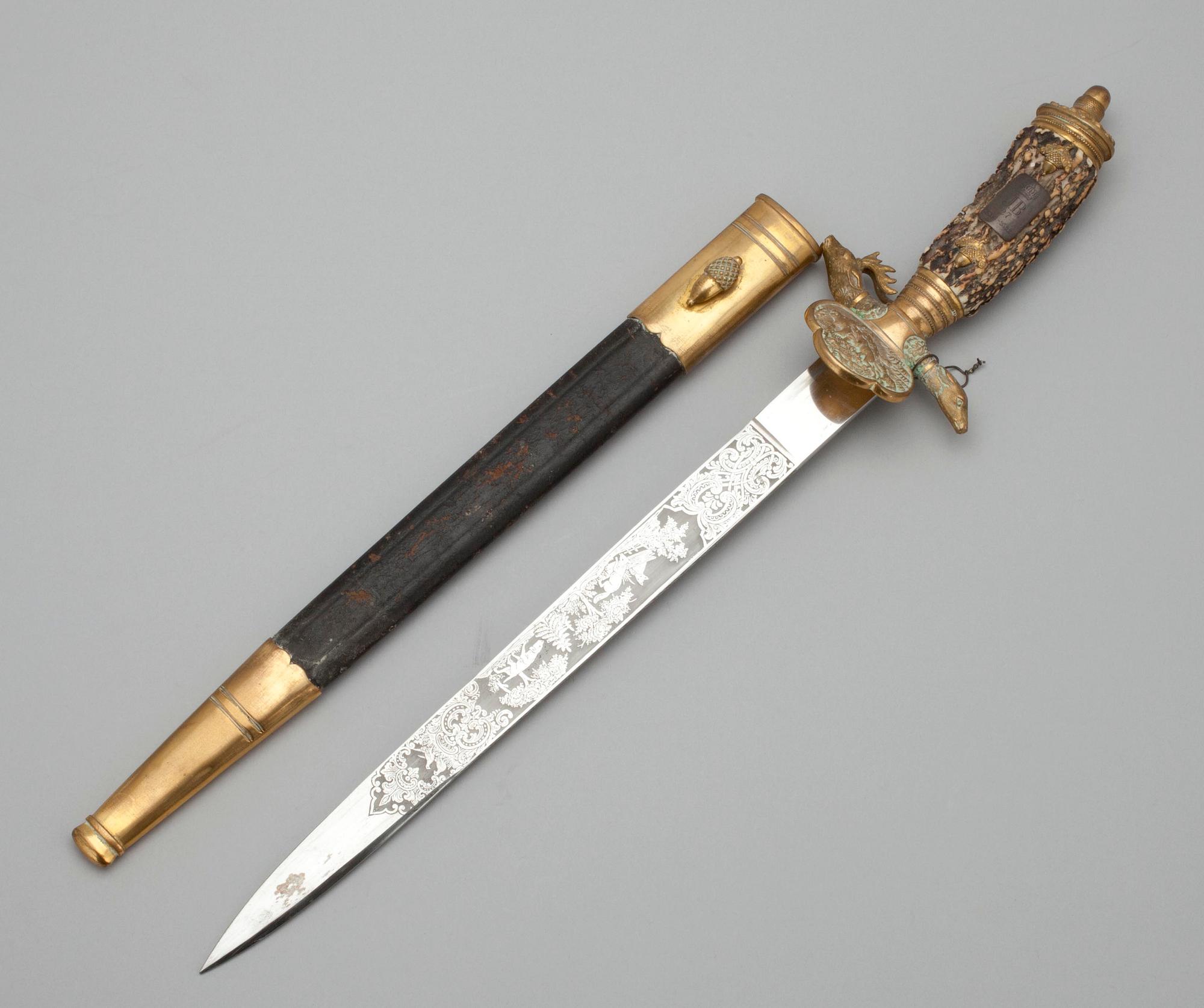 HIRSCHFÄNGER, Tyskland. Med Jägarbataljonens silverbeslag JB 27 25.2.18-25.2.38.