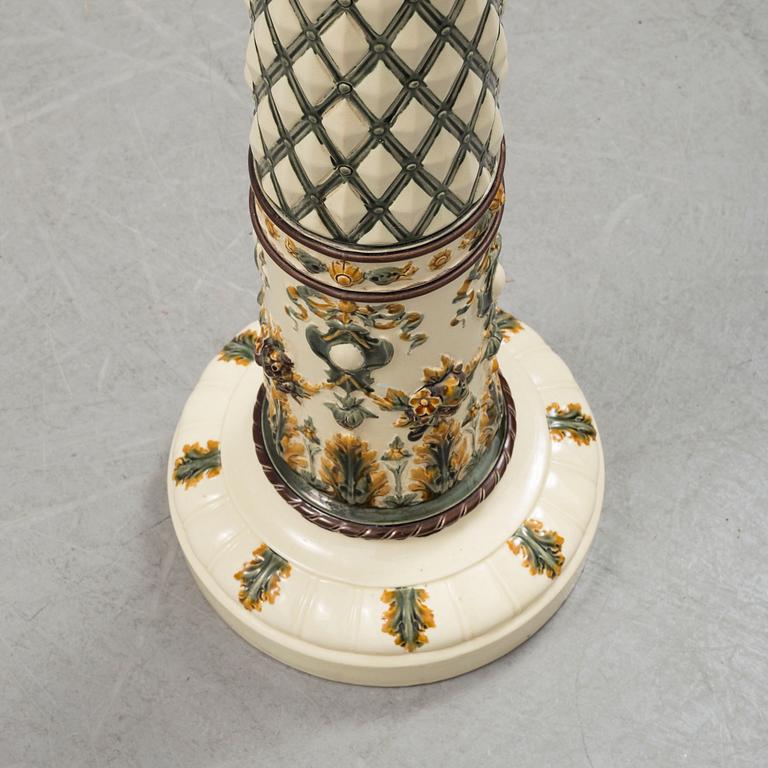 An end of the 19th century maiolica pedestal by Rörstrand.