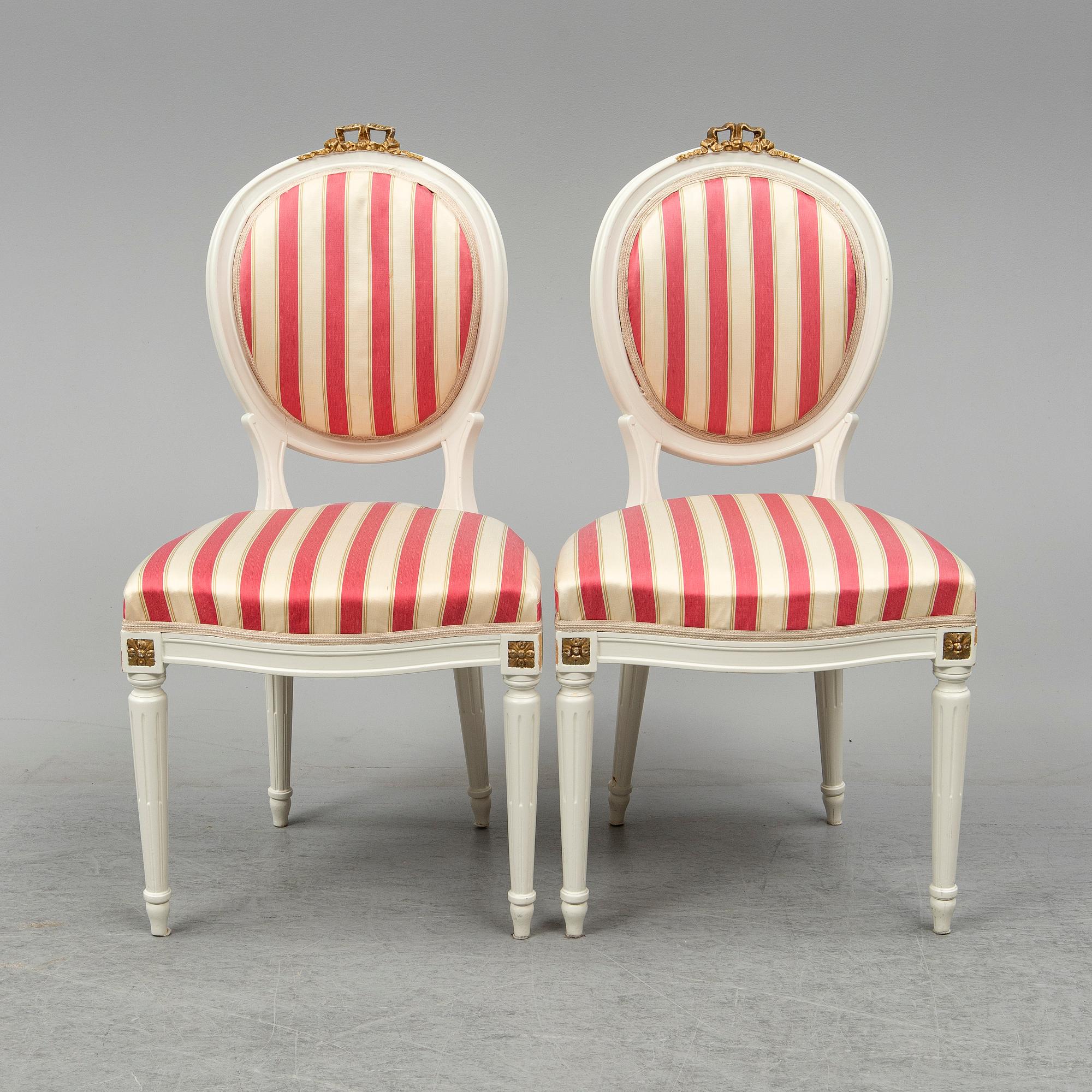 A set of 12 Swedish chairs, gustavian style, for NK (Nordiska Kompaniet), mid 20th century.