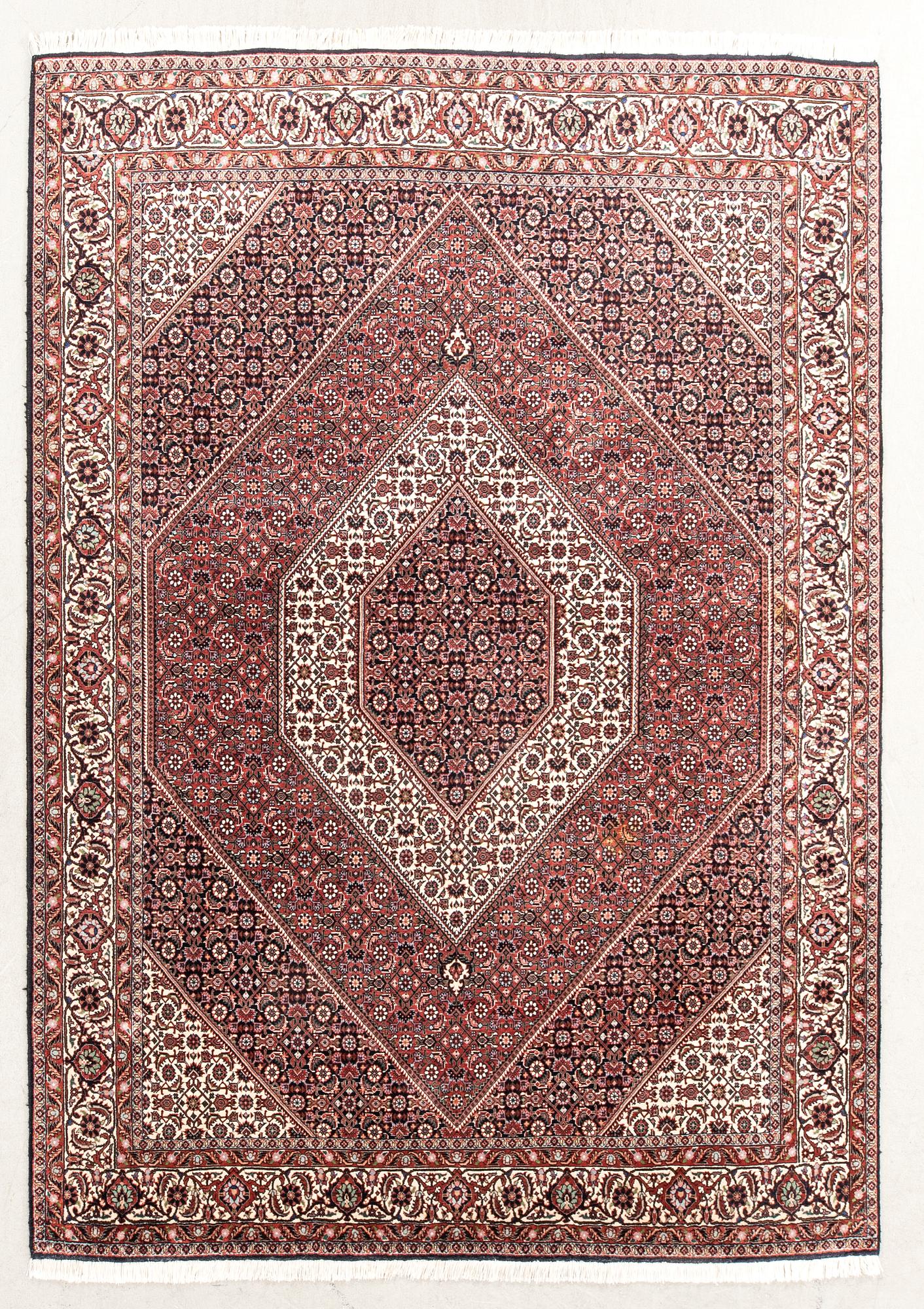 An old Bidjar carpet approx 240x174 cm.