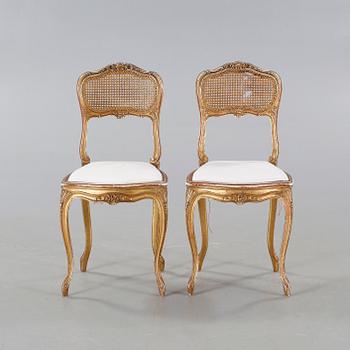 A pair of chairs from the first half of the 20th century.