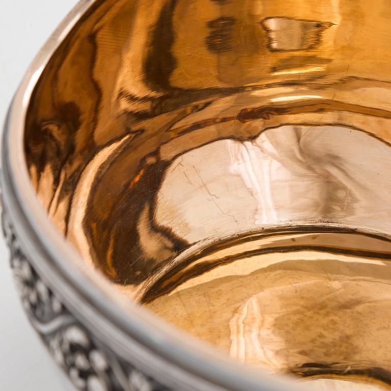 A parcel-gilt kovsh, maker's mark of Mikhail Tarasov, Moscow 1908-14. Length 40 cm.