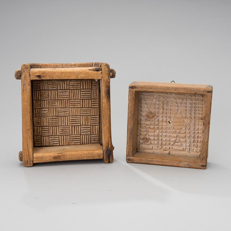 Two Finnish 18th/19th century wooden cheese moulds.