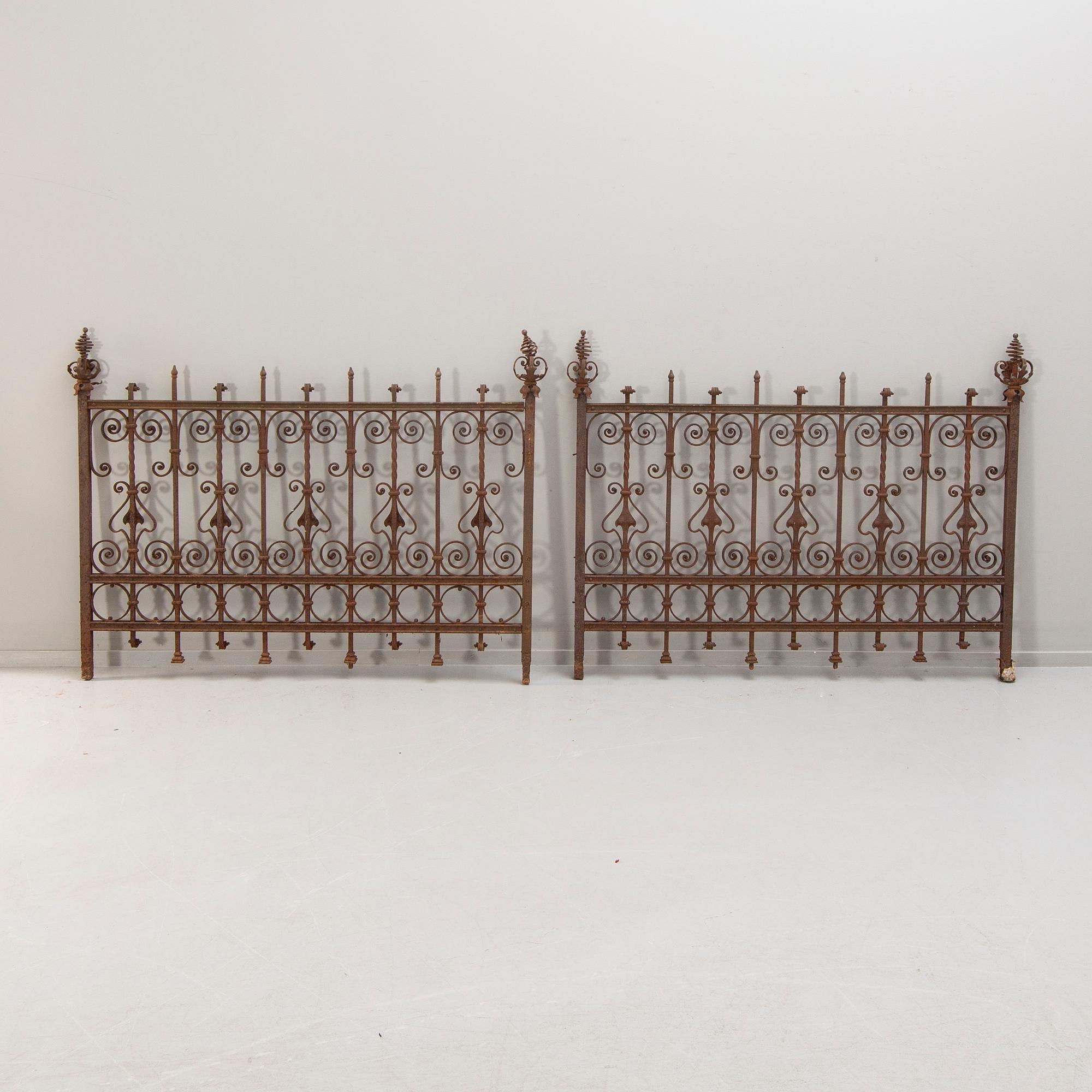 A cast iron two part fence around 1900.