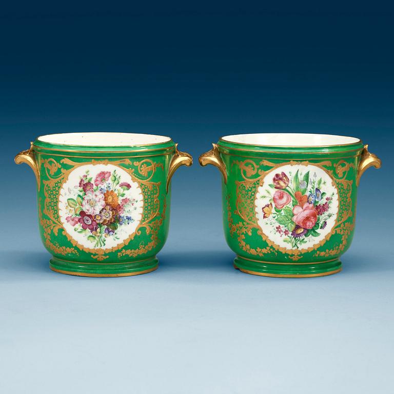 A pair of green Sèvres wine coolers, 18th Century. Possibly decorated later.