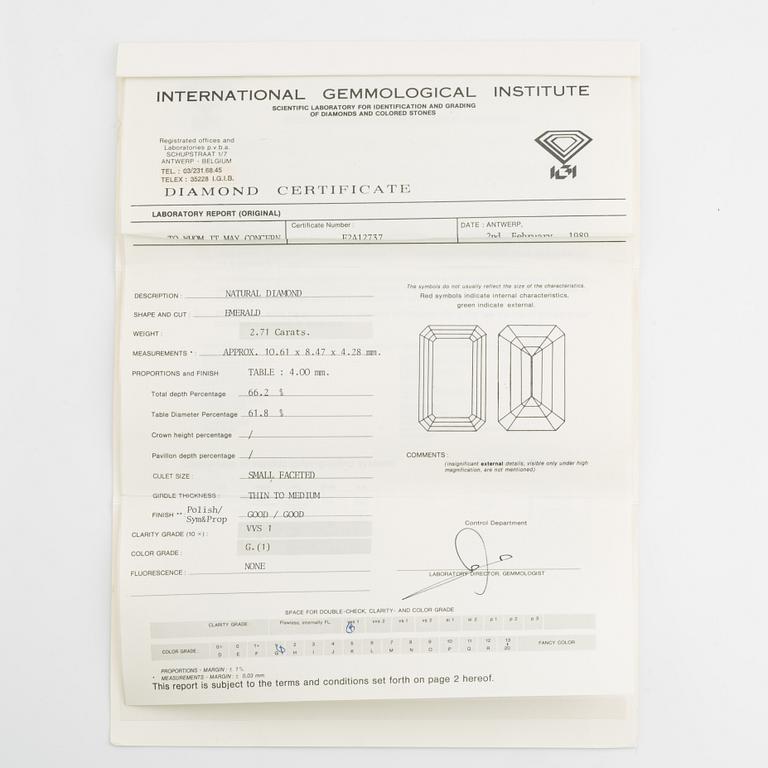 A loose emerald-cut diamond 2.71 ct with accompanying IGI 1989 report.