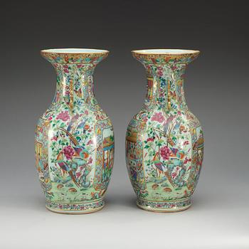 A pair of famille rose Canton vases, Qing dynasty, 19th Century.