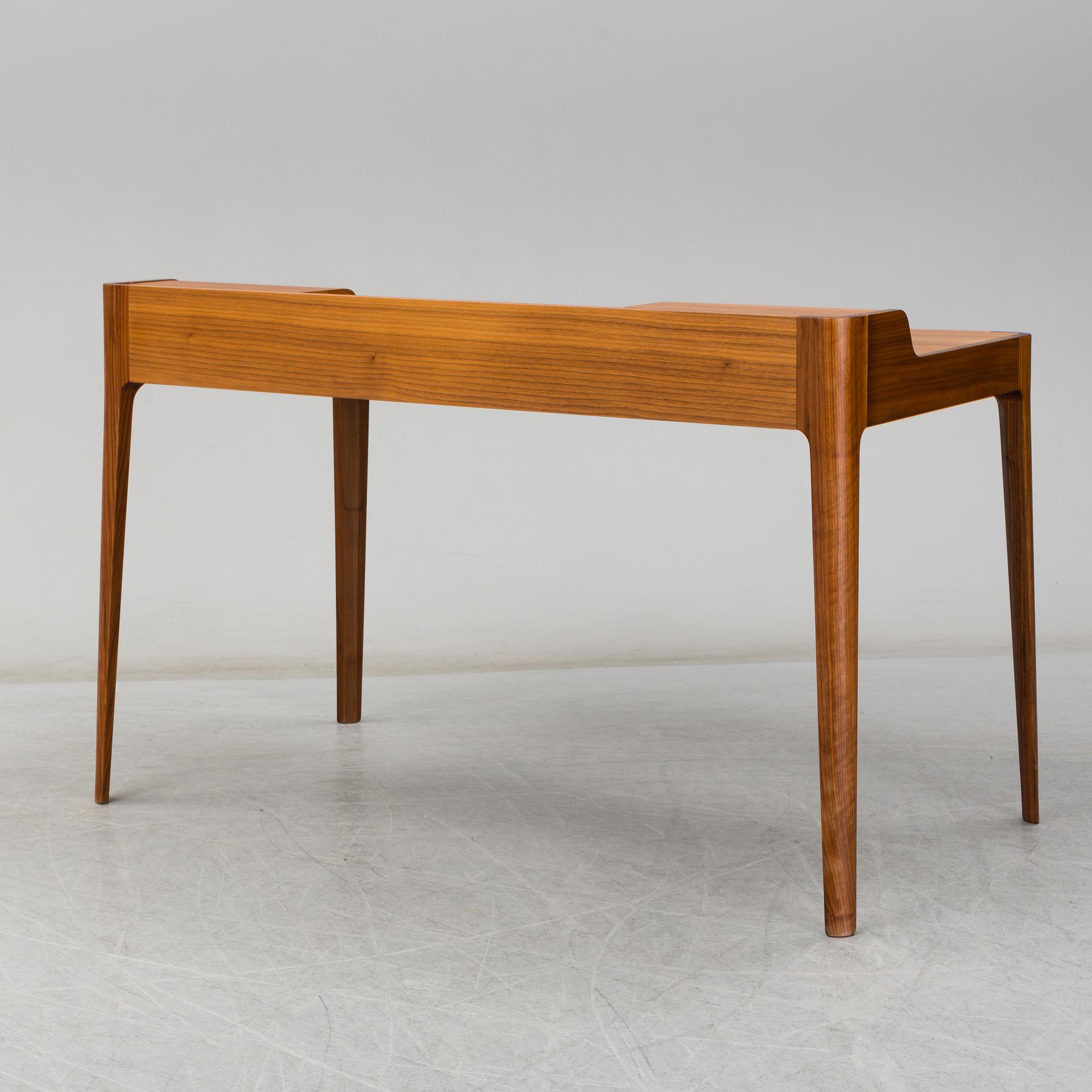 A 21st Century walnut 'Saffo' writing desk by Carlo Ballabio, from Porada.
