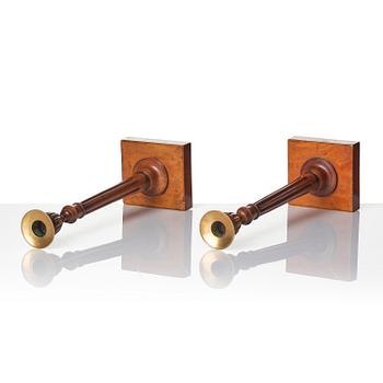 A pair of George III mahogany candlesticks, circa 1800.