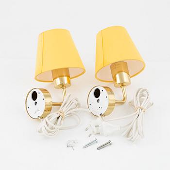 Josef Frank, a pair of model 2143 brass wall lights, Firma Svenskt Tenn, Sweden.
