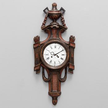 A CARVED WOOD WALL CLOCK, 19th century.