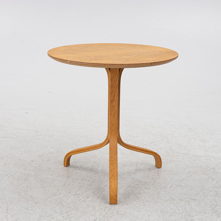 Yngve Ekström, a 'Lamino' armchair with ottoman and sidetable, Swedese, Sweden, 21st century.