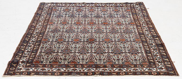 An antique/semi-antique Abadeh rug, Western Iran, c. 202 x 150 cm.