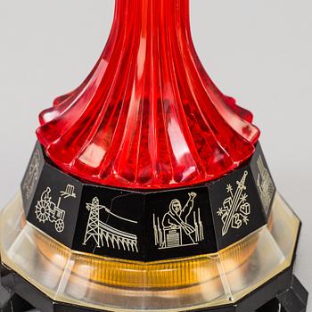 Soviet perspex table lamp with a rocket Finial, depicting Yri Gagarin's trip in space, the base showing Soviet symbols.