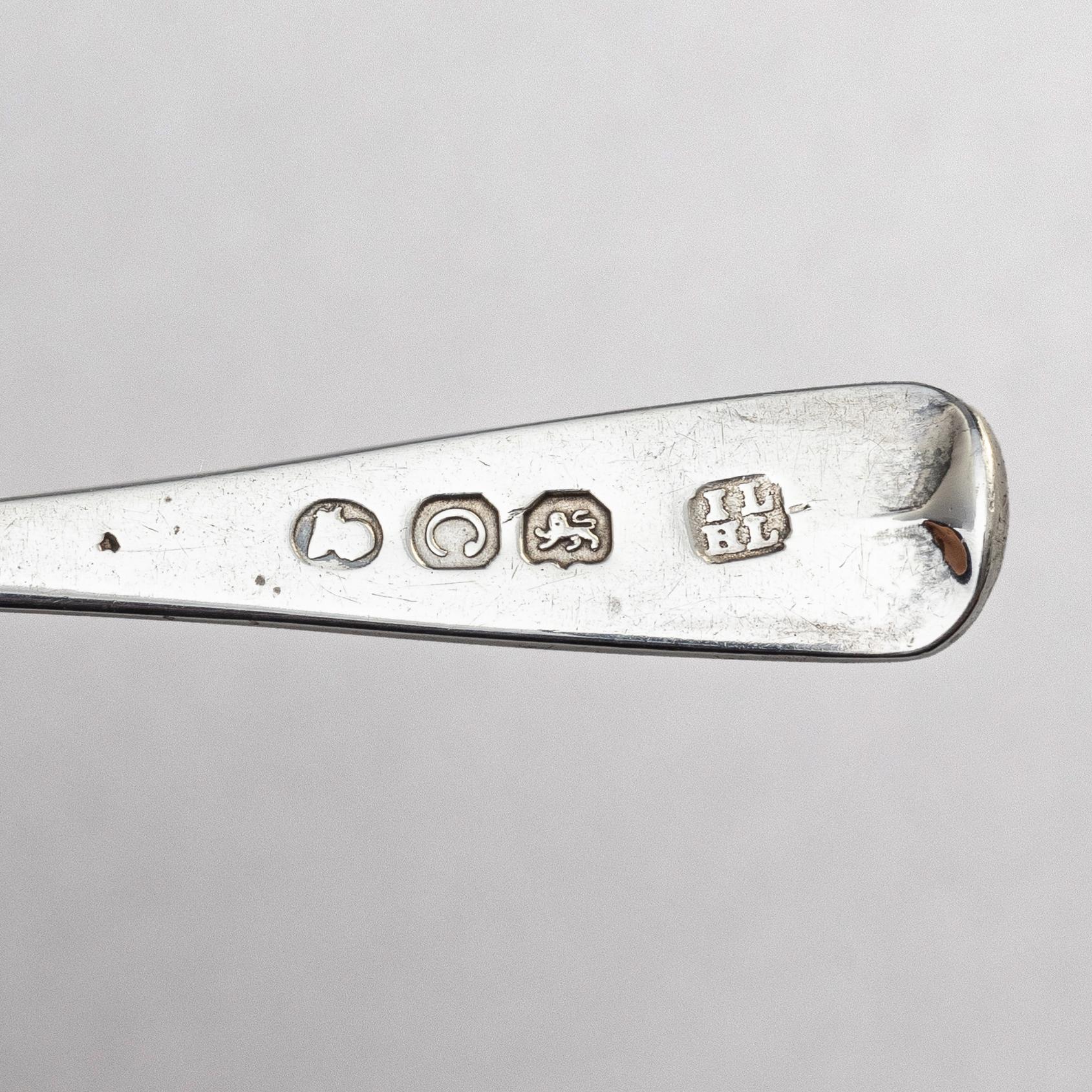 Four English 18th century silver salt-cellars, mark of William Fountain & Daniel Pontifax, London 1791, and spoons.