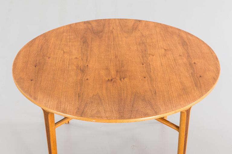AN AX COFFE TABLE BY HVIDT & MOLGAARD.