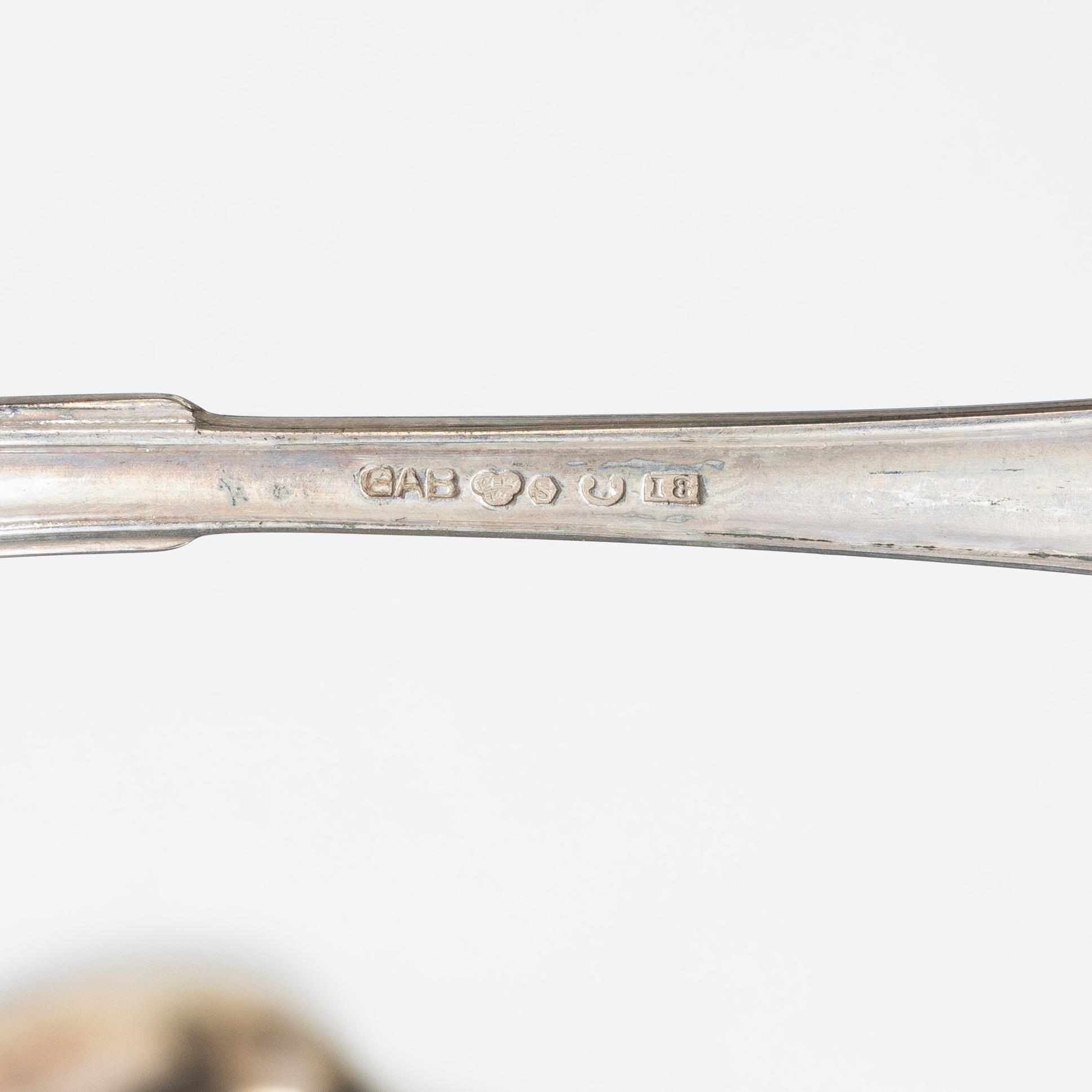 45 pieces of silver cutlery, model "Svensk spets" GAB and C.G. Hallberg, Stockholm, second half of the 20th century.