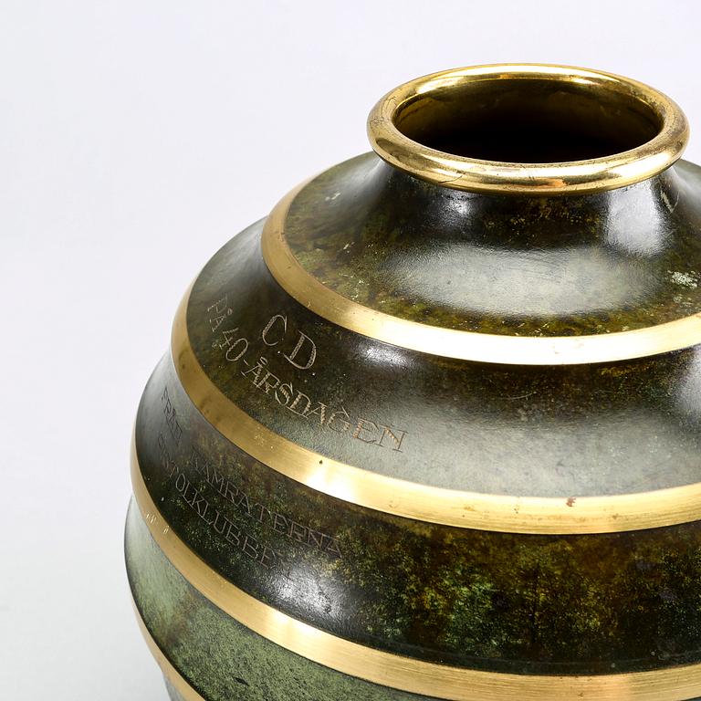 A Swedish Art Deco metal vase.