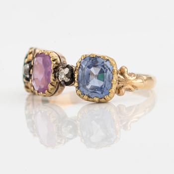 Ring in 18K gold with likely synthetic ruby, sapphire, emerald, and old-cut diamonds.