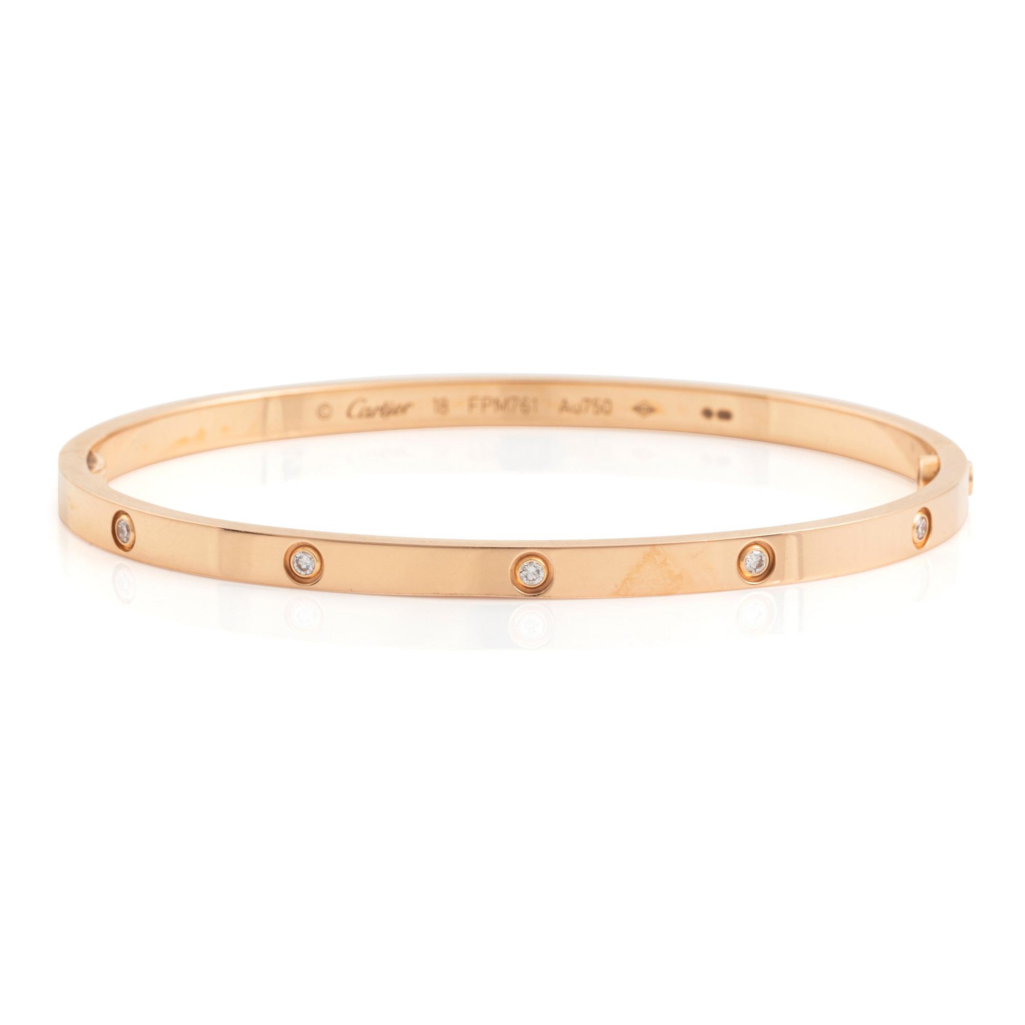 A Cartier "Love" bracelet small model in 18K rose gold with ten round brilliant-cut diamonds.