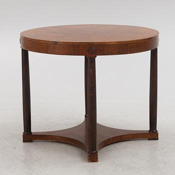 An Empire style table, 1920s.