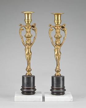 LJUSSTAKAR, ett par, empirestil, omkring 1900.