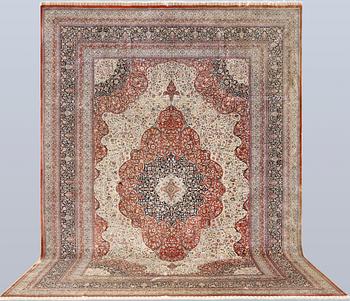 An Oriental silk carpet, c. 463 x 306 cm.