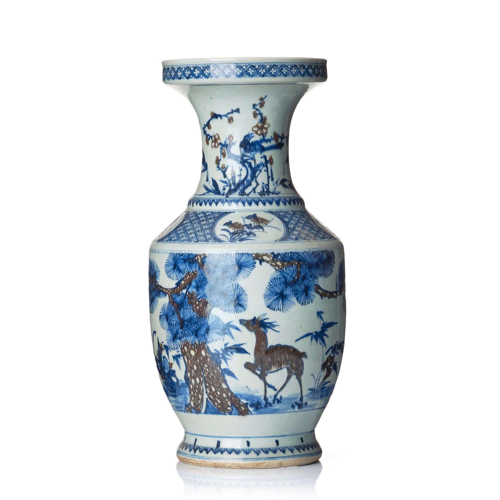 A blue and white and iron red vase. Qing dynasty, 19th century.
