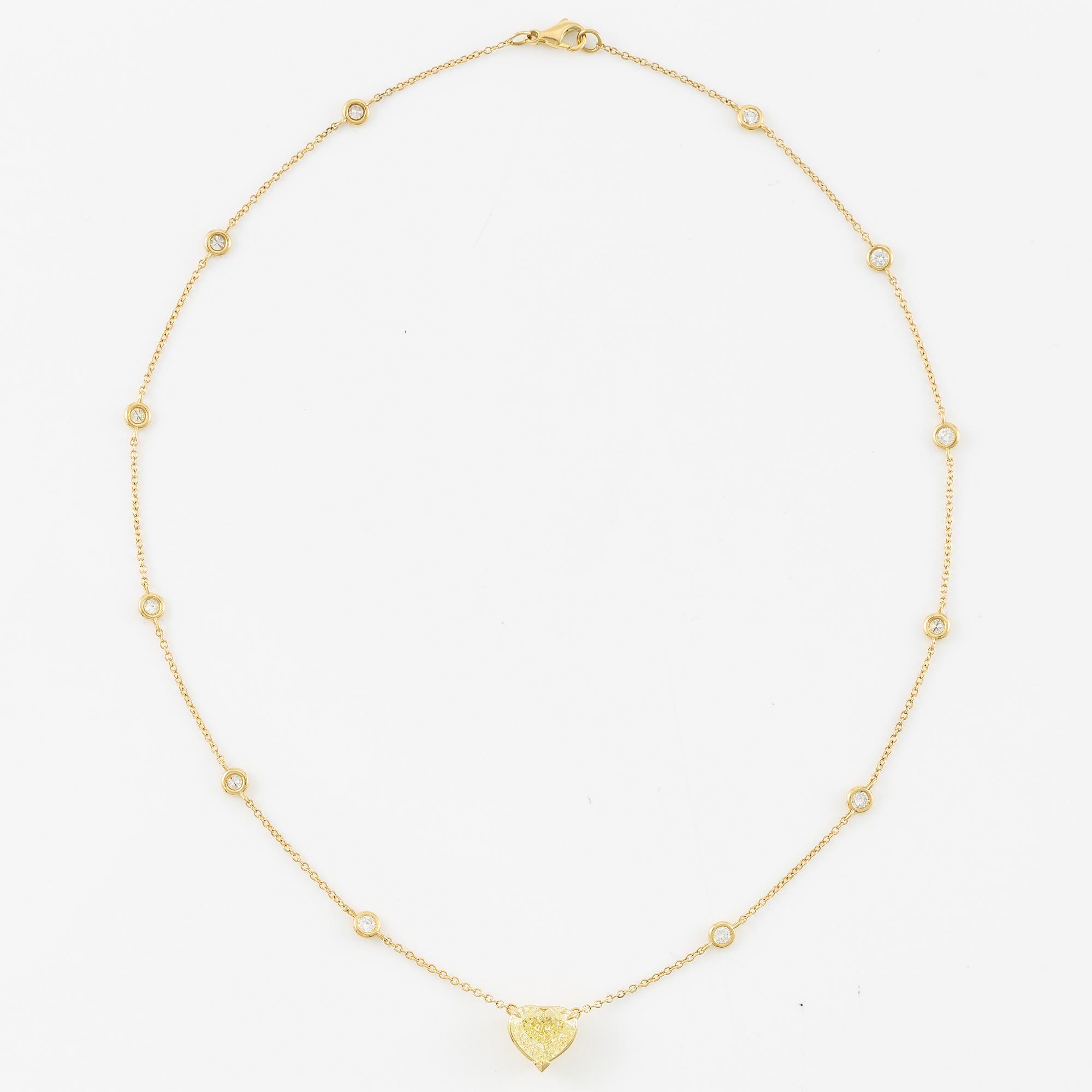 A necklace in 18K gold with a heart-shaped yellow brilliant-cut diamond 4.00 ct Fancy Yellow si1.