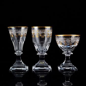 An extensive Kosta Junior glass service, 20th Century. (124 pieces).