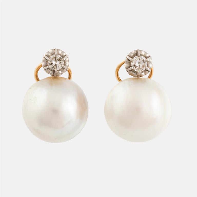 Gold and mabe pearl and brilliant cut diamond earrings.