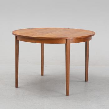 A teak veneered dining table, 1960's.