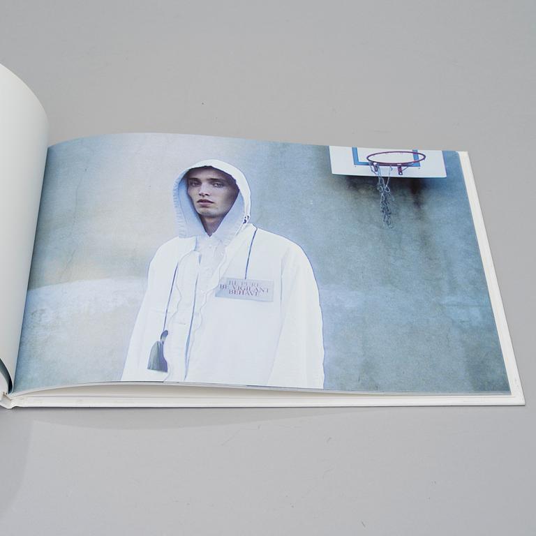 RAF SIMONS, A BOOK, Woe Onto Those Who Spit on the Fear Generation the Wind Will Blow it Back..., signed and numbered.