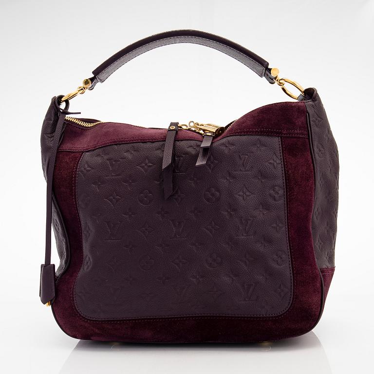 Louis Vuitton, a Monogram Empreinte 'Audacieuse' bag.