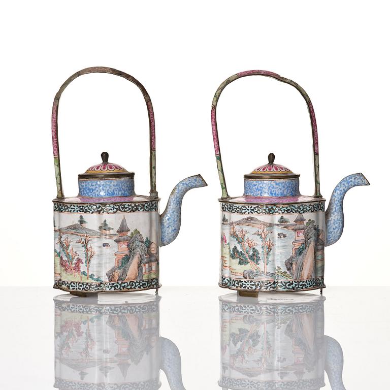 A Chinese pair of enamel on copper tea pots, Qing dynasty, Qianlong (1736-95).