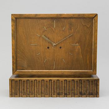 Axel Einar Hjorth, a stained birch "Caesar" mantel clock, Nordiska Kompaniet, Sweden 1920-30's.