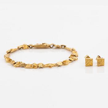 Lapponia, ett armband och ett par örhängen, 18K guld.