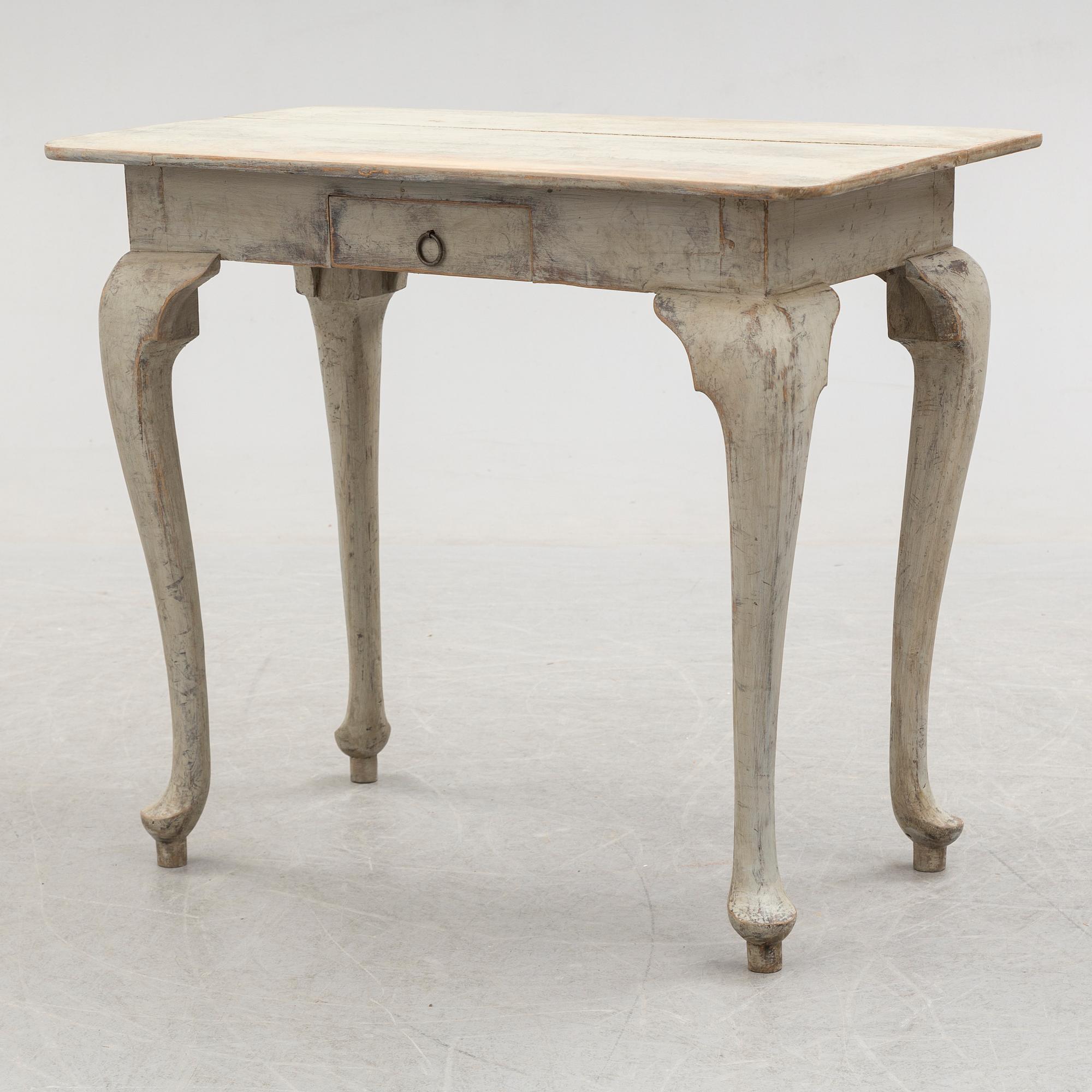 An 18th century painted rococo table.