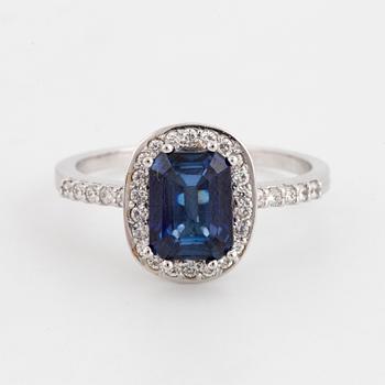 18K white gold and sapphire and brilliant-cut diamond cluster ring.