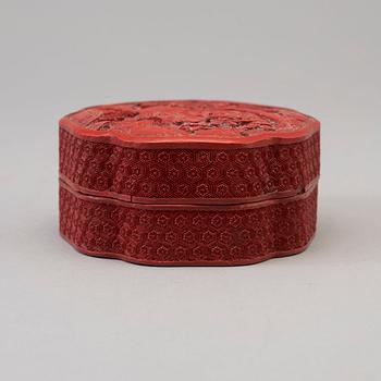 A Chinese red lacquered box with cover, circa 1900.