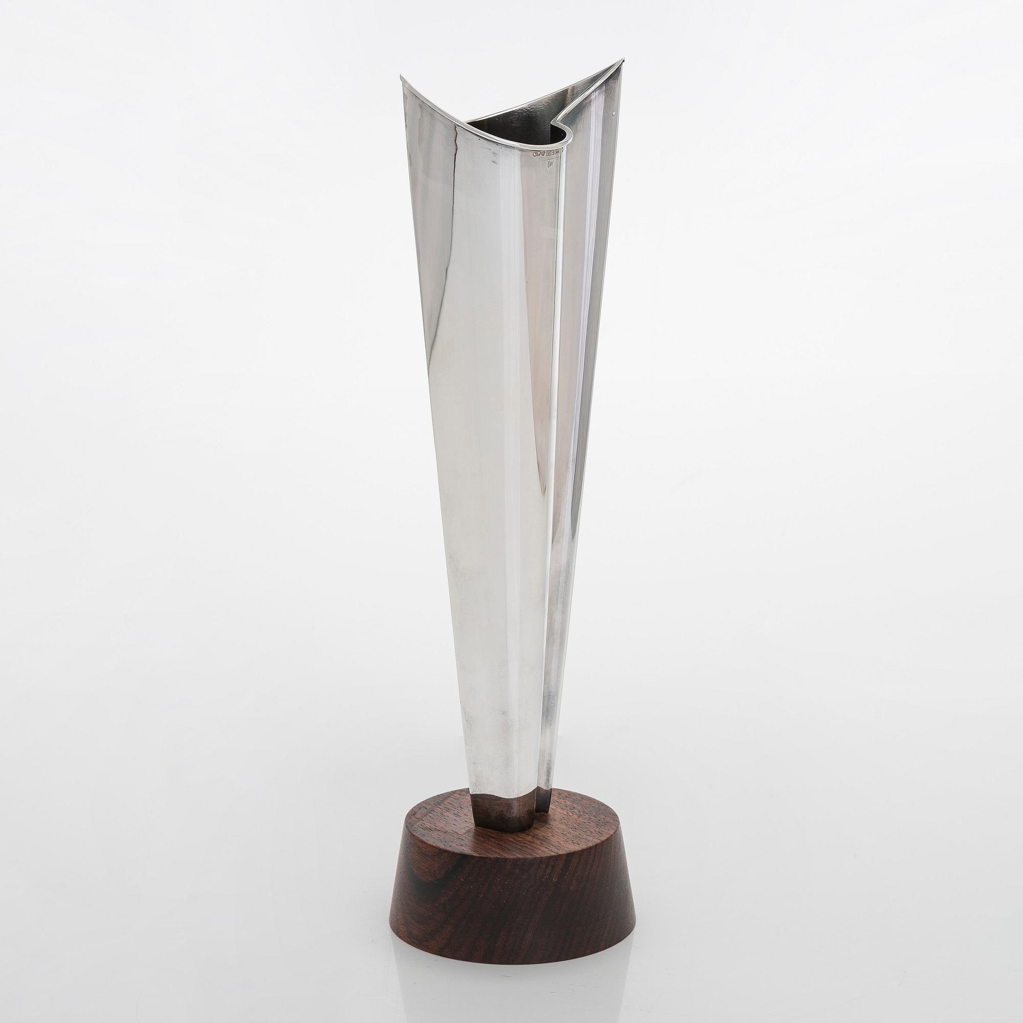 Tapio Wirkkala, a silver TW 228 'Flame' vase on a rosewood base, Kultakeskus, Hämeenlinna 1965.